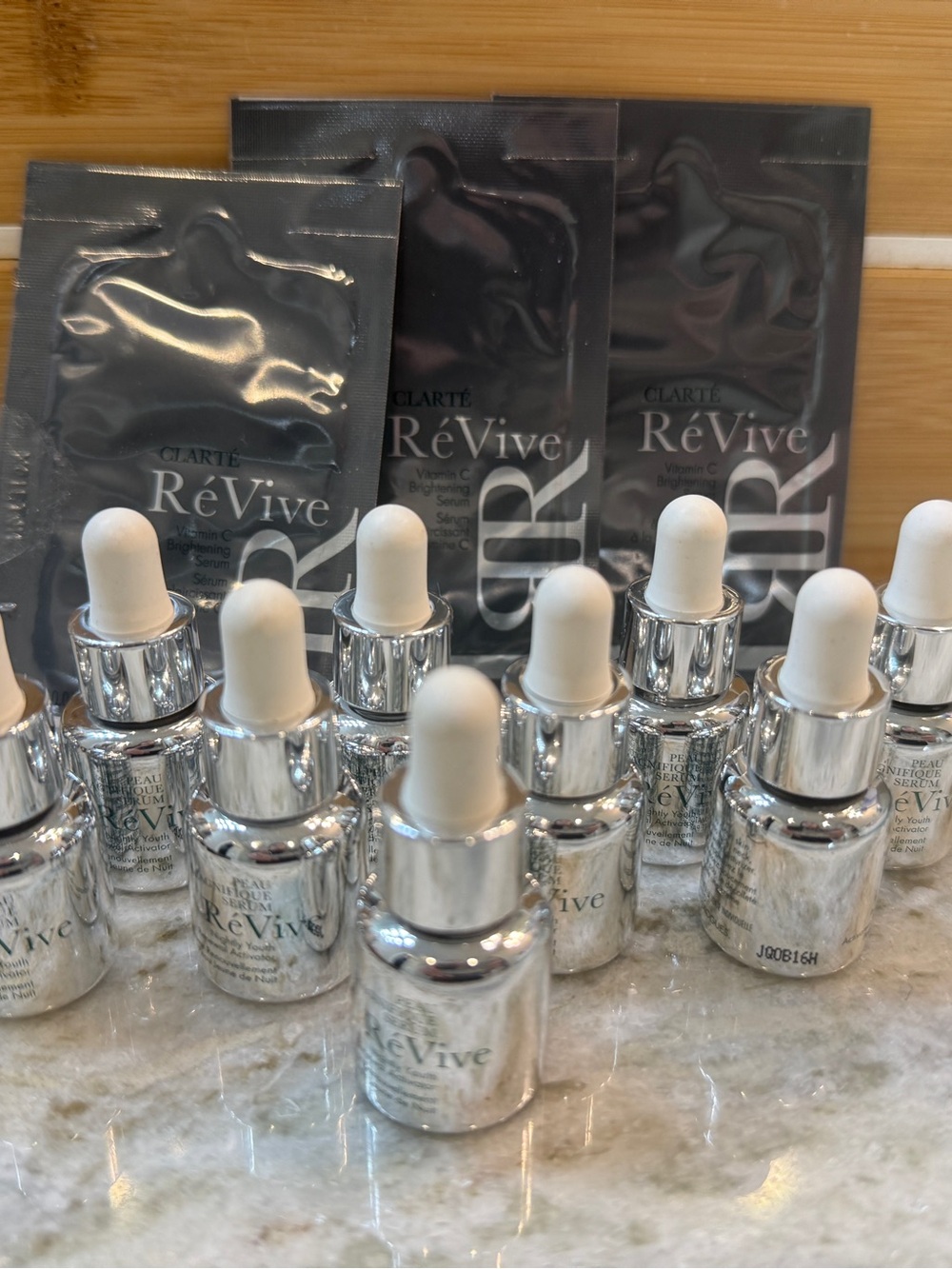 Revive 13 samples of skincare including 10 peau magnifique and 3 clarte serum